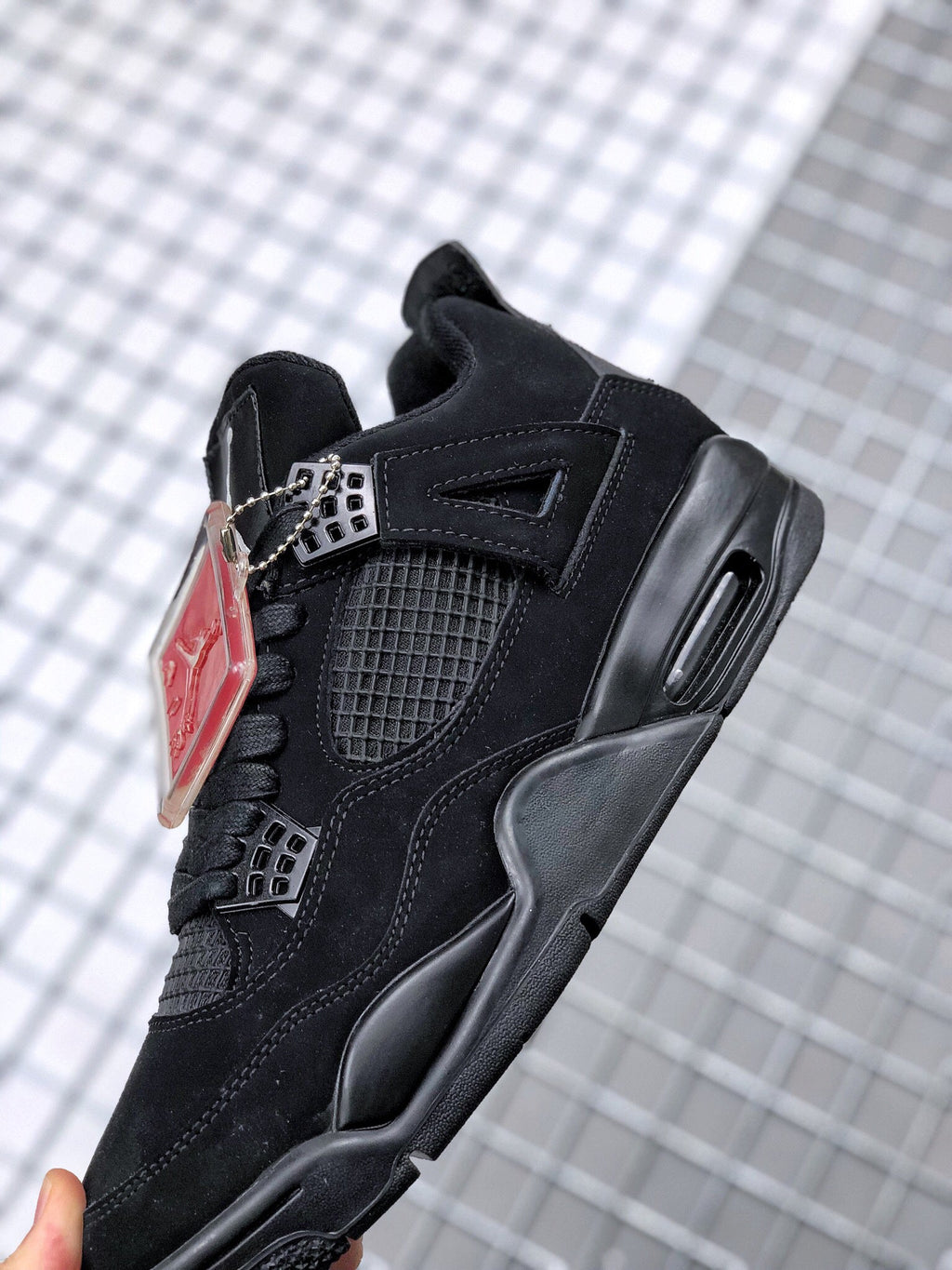 Air Jordan 4 Black Cat Sneakers CU1110-010 - product image from the listing.