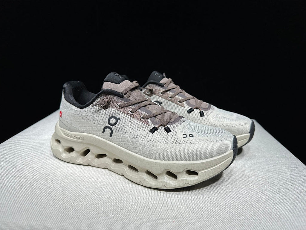 On Cloudtilt Sneakers, in Light Gray and Black - product image from the listing.