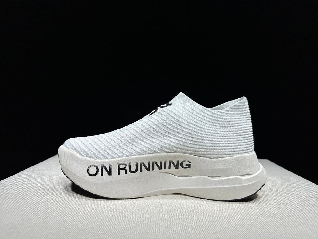 On Cloudboom Strike LS Running Shoes in White Black - product image from the listing.