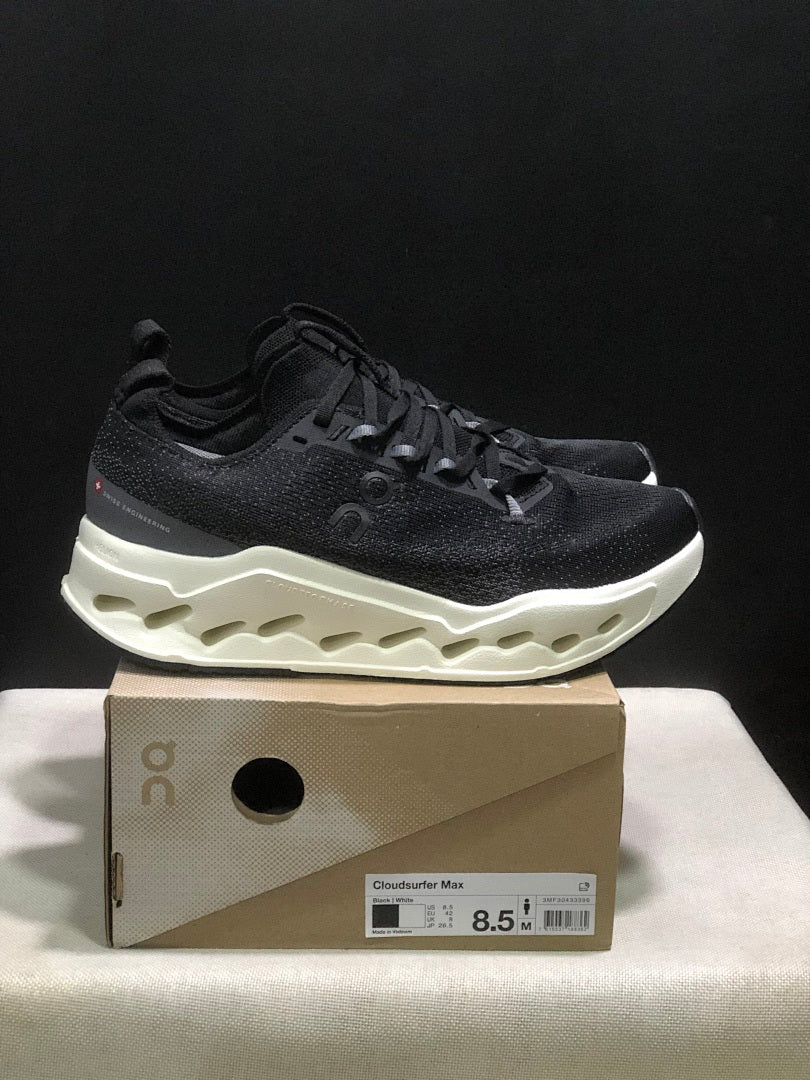 On Cloudsurfer Max Running Sneakers in Black and White - product image from the listing.