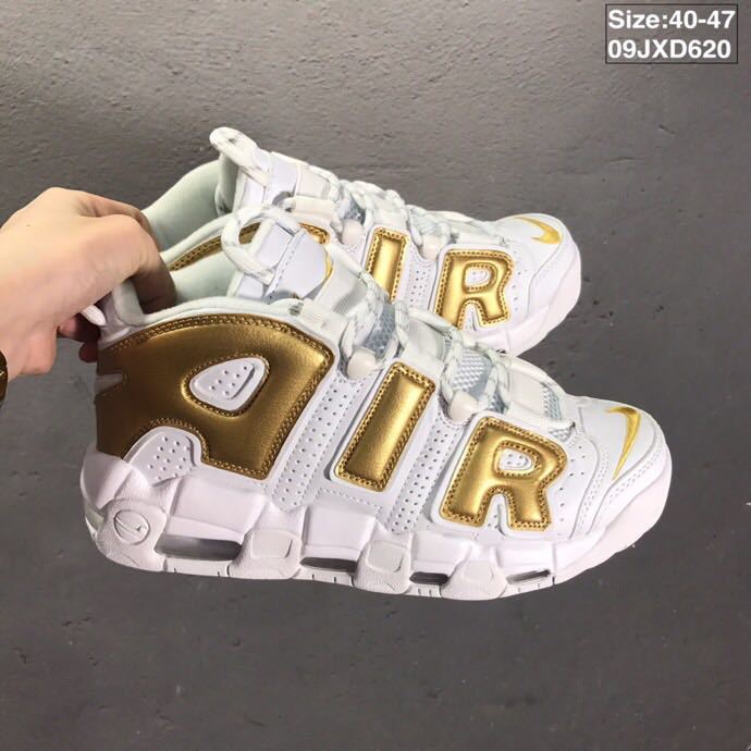 Nike Air More Uptempo Sneakers in White and Metallic Gold - product image from the listing.