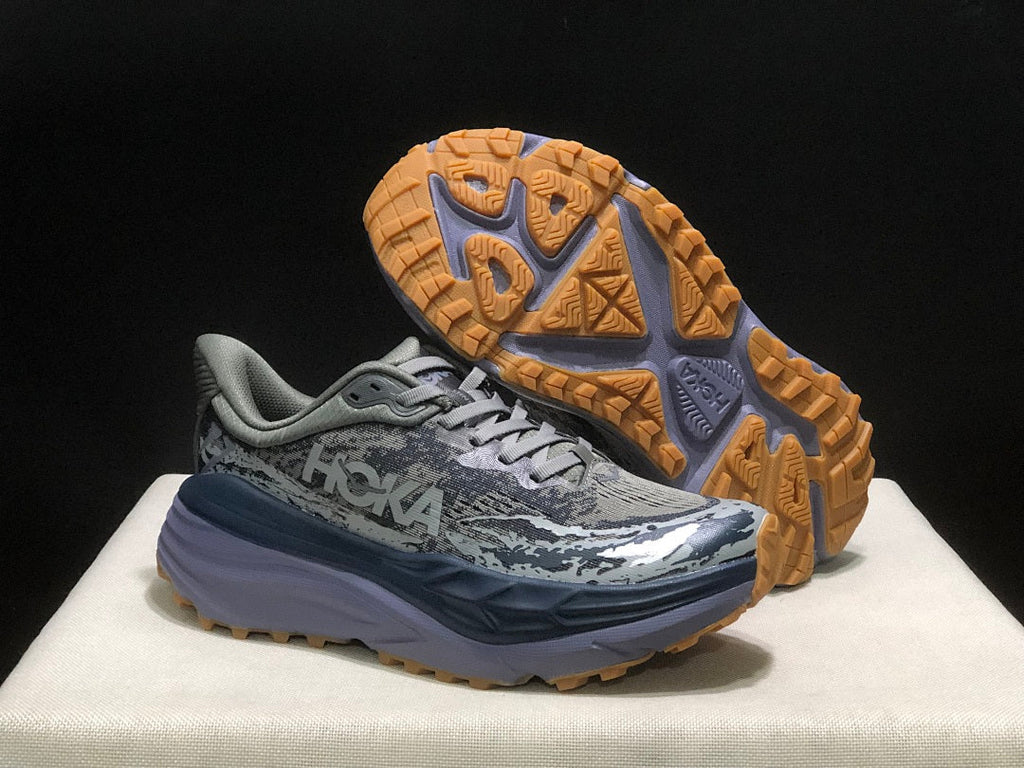 Gray HOKA Stinson 7 Trail Running Shoes - product image from the listing.