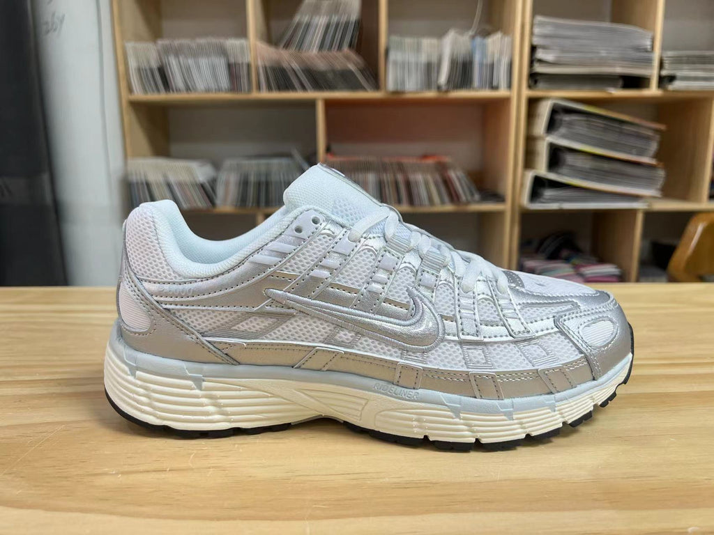 Nike P-6000 Sneakers in White and Grey BV1021-106 - product image from the listing.