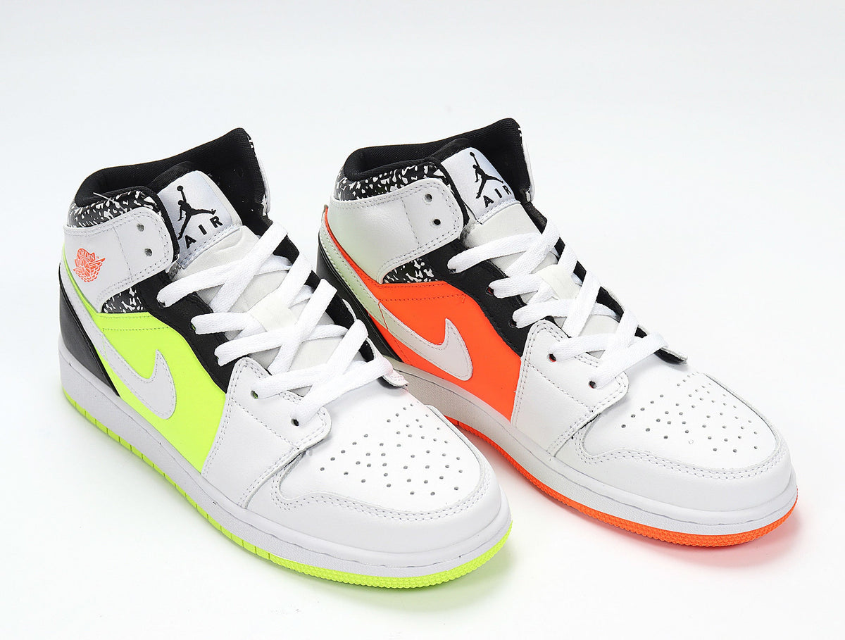 Jordan 1 Low Sneakers in Yellow Orange 554725-870 - product image from the listing.