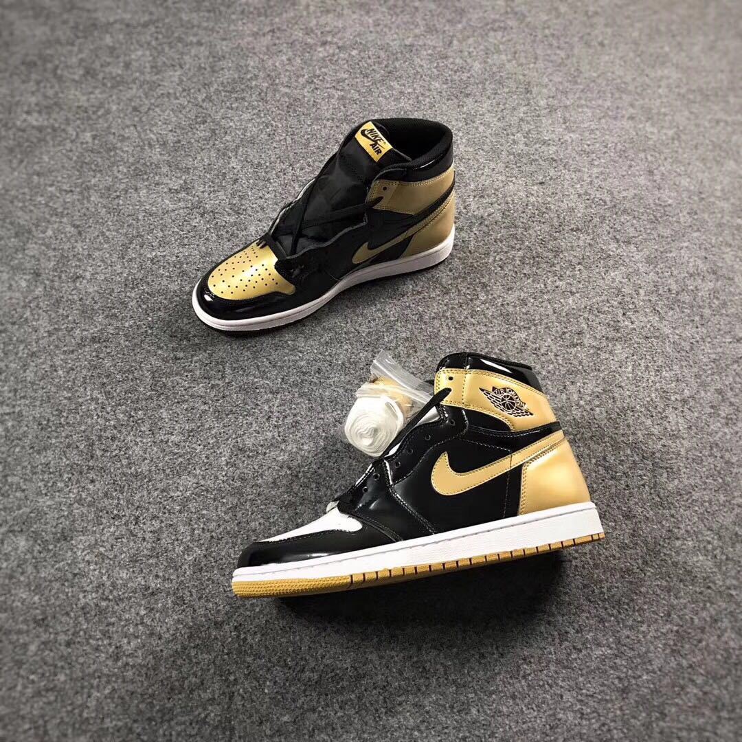 Jordan 1 High Mismatched Sneakers in Black Gold White - product image from the listing.
