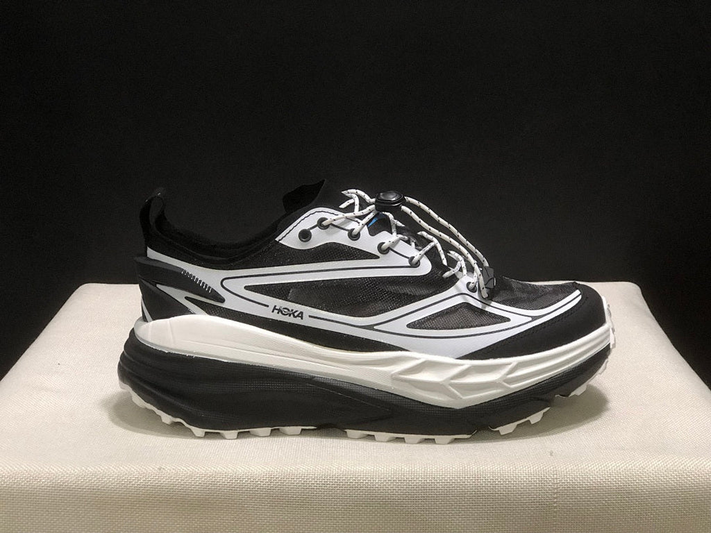 HOKA Stinson One 7 Black and White Trail Trainers - product image from the listing.