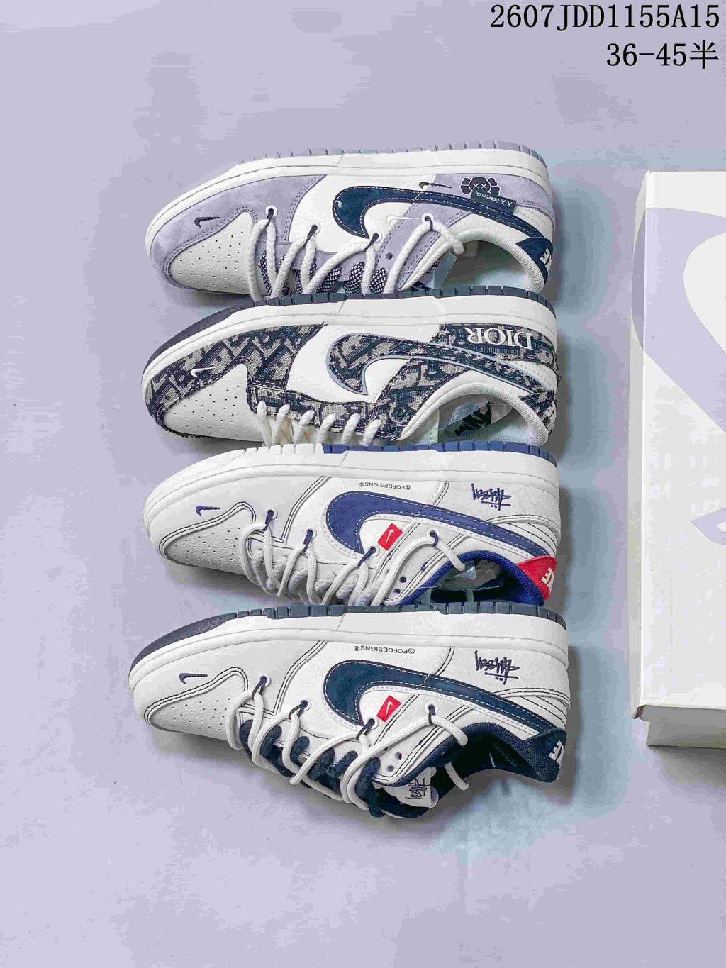Nike SB Dunk Low Trainers in White, Gray and Navy Styles - product image from the listing.
