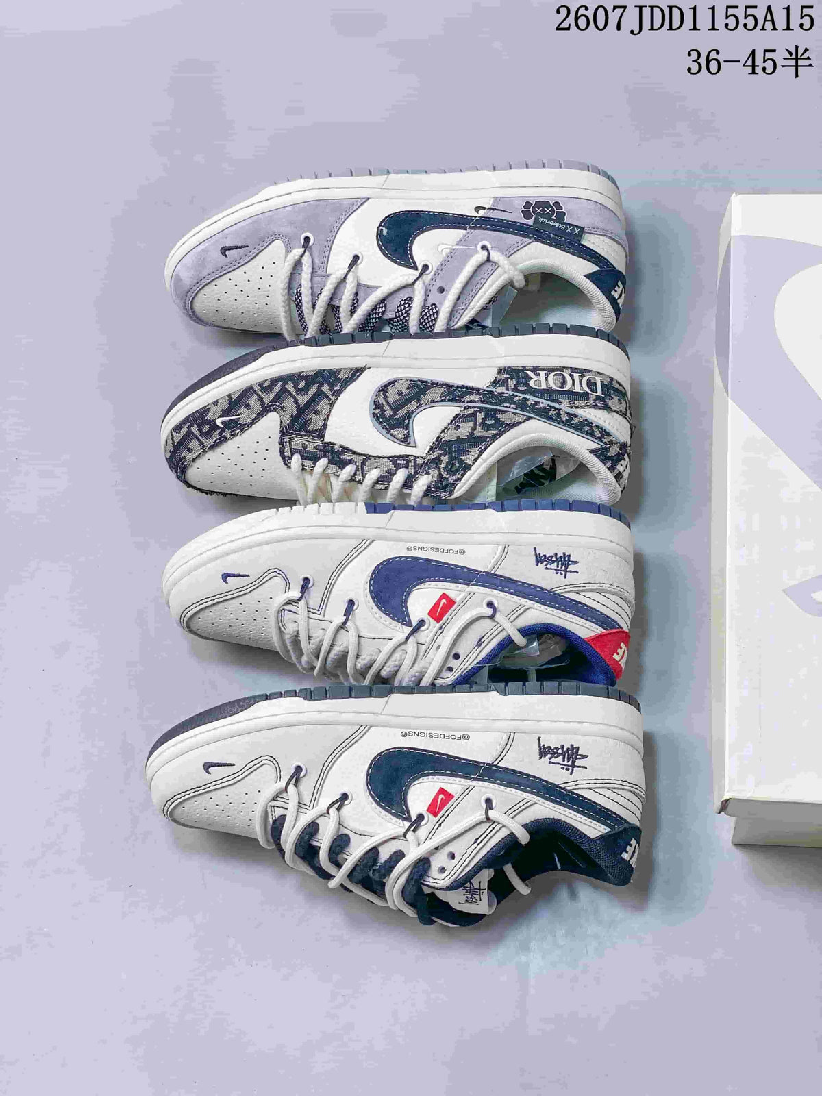 Nike SB Dunk Low Trainers in White, Gray and Navy Styles - product image from the listing.