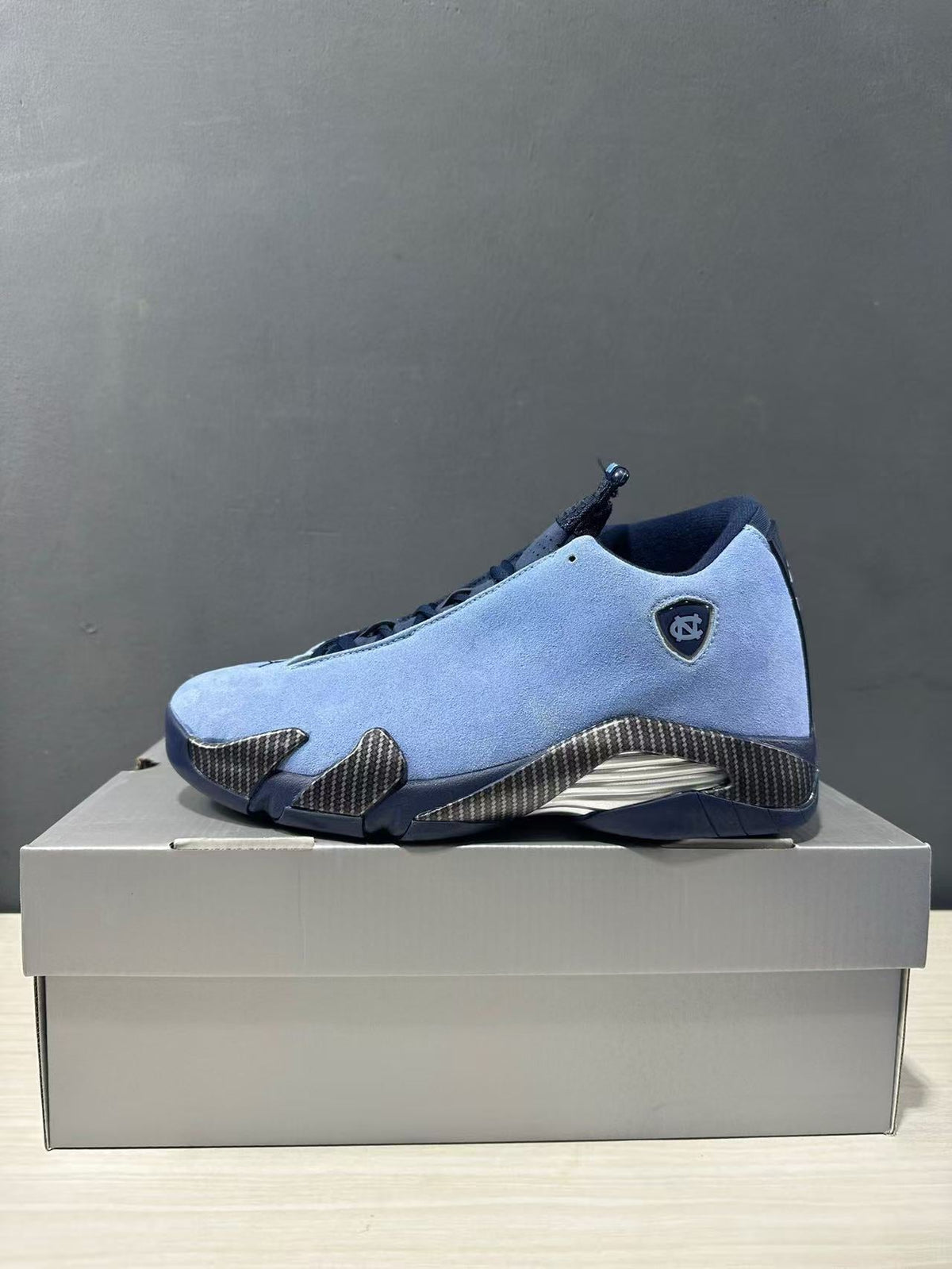 Air Jordan 14 Retro Howard PE Blue Sneakers IF5015-407 - product image from the listing.