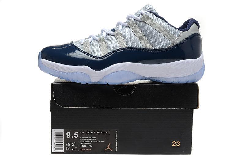 Air Jordan 11 Retro Low Sneakers, White and Navy - product image from the listing.
