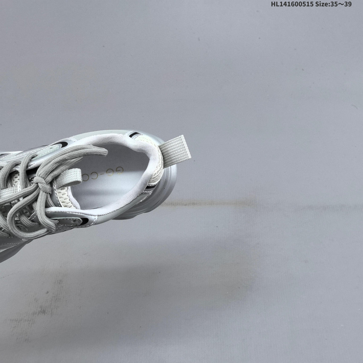 GG-CC G23X4317B Chunky Platform Sneakers, in Silver and White - product image from the listing.