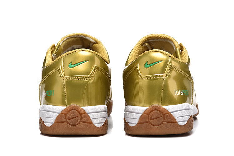 Nike Total90 Indoor Soccer Shoes in Gold Green - product image from the listing.