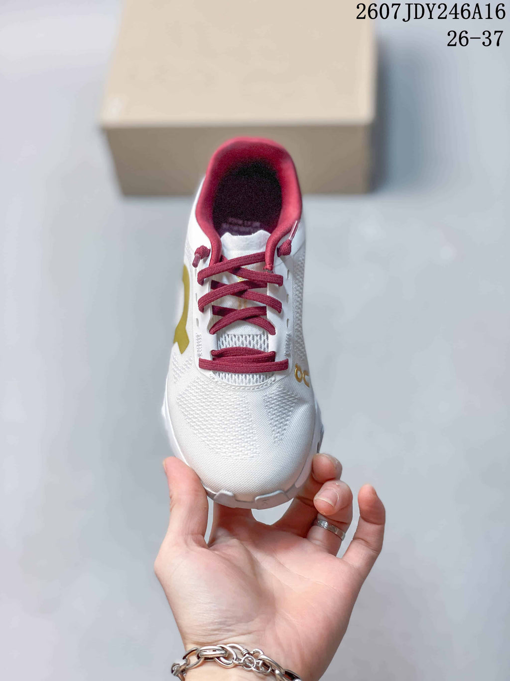 On Cloudstratus 3 Kids' Running Shoes in White Burgundy Yellow - product image from the listing.