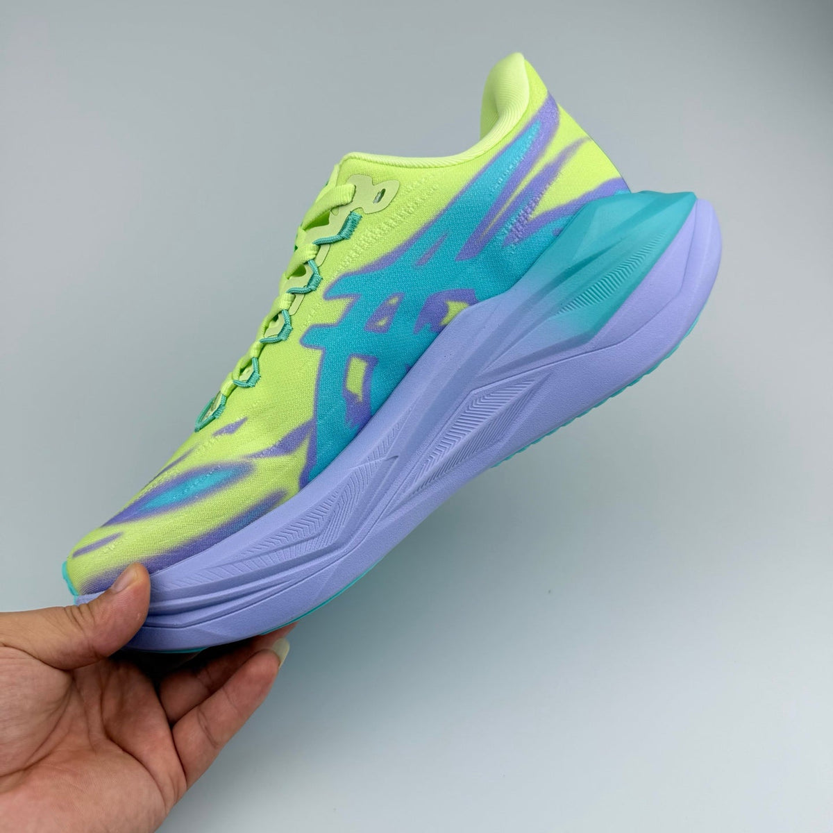Nike Running Shoes in Volt Green, in Teal and Purple - product image from the listing.