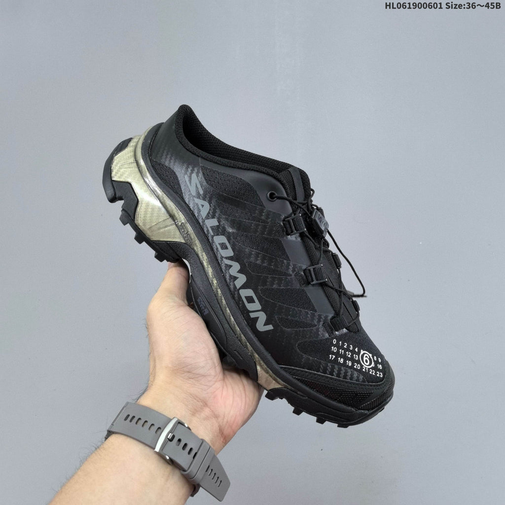 Black and Silver Salomon XT-4 Mule Sneakers - product image from the listing.