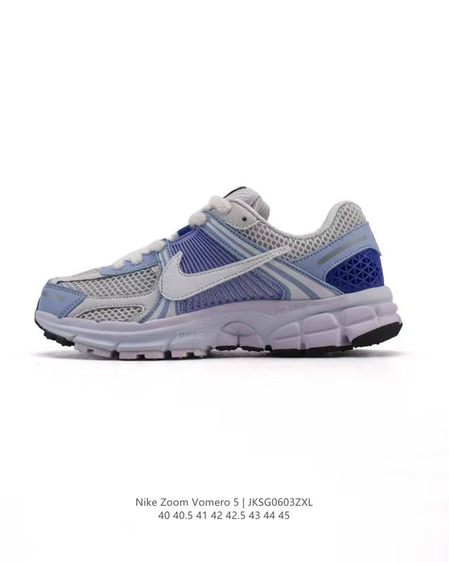 Nike Zoom Vomero 5 Sneakers in Light Blue JKG603ZXL - product image from the listing.