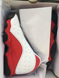 Air Jordan 13 Sneakers in White Red Black - product image from the listing.