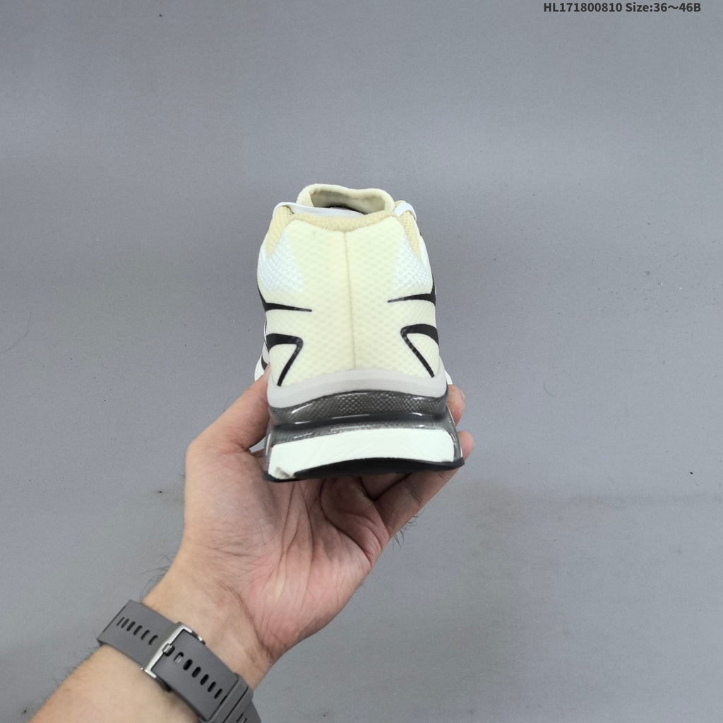 MM6 Maison Margiela x Salomon XT-4 Sneakers, in White and Black - product image from the listing.