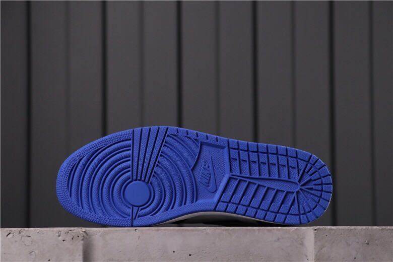 Air Jordan 1 Game Royal High-Top Sneakers in Black Blue White - product image from the listing.