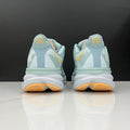 HOKA Clifton 9 Running Shoes in Mint and Yellow - product image from the listing.