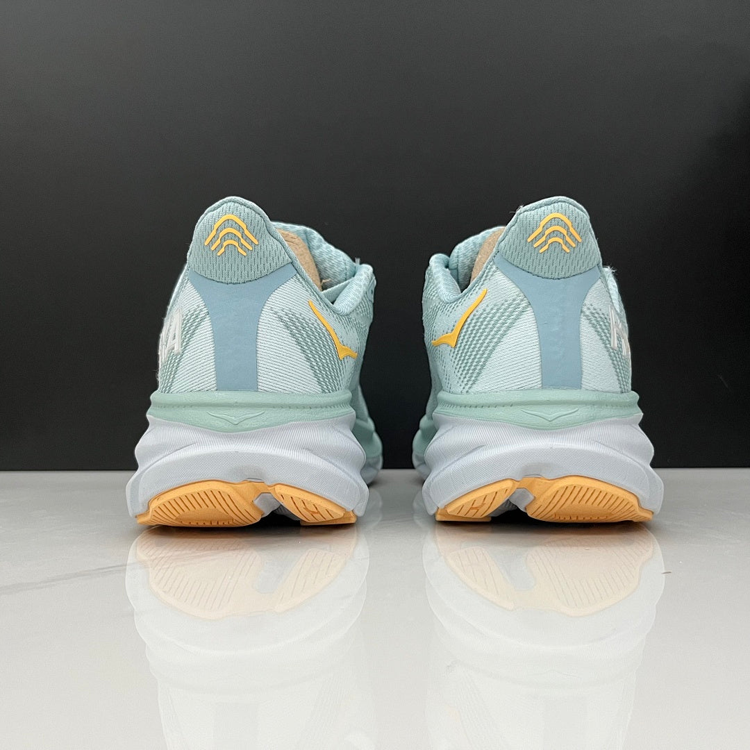 HOKA Clifton 9 Running Shoes in Mint and Yellow - product image from the listing.