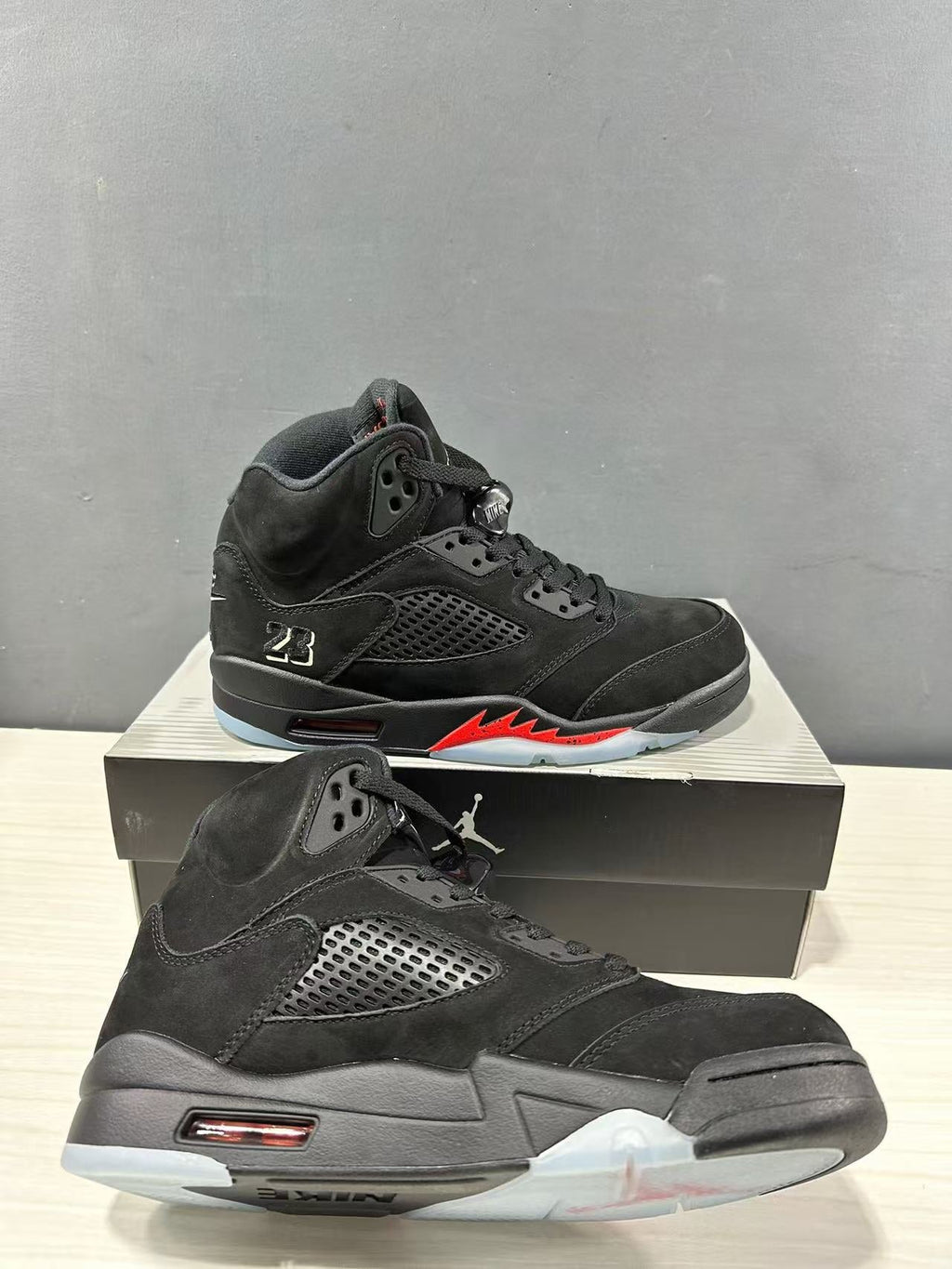 Air Jordan 5 Retro Sneakers Black and Red - product image from the listing.