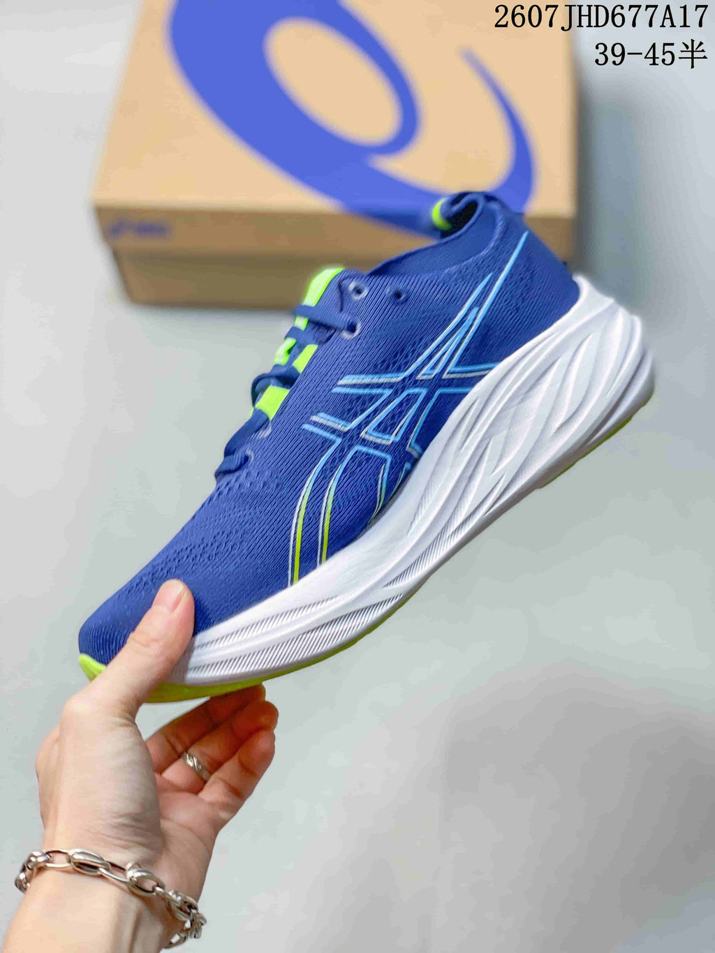 ASICS Gel-Nimbus 26 Running Shoes in Blue Green - product image from the listing.