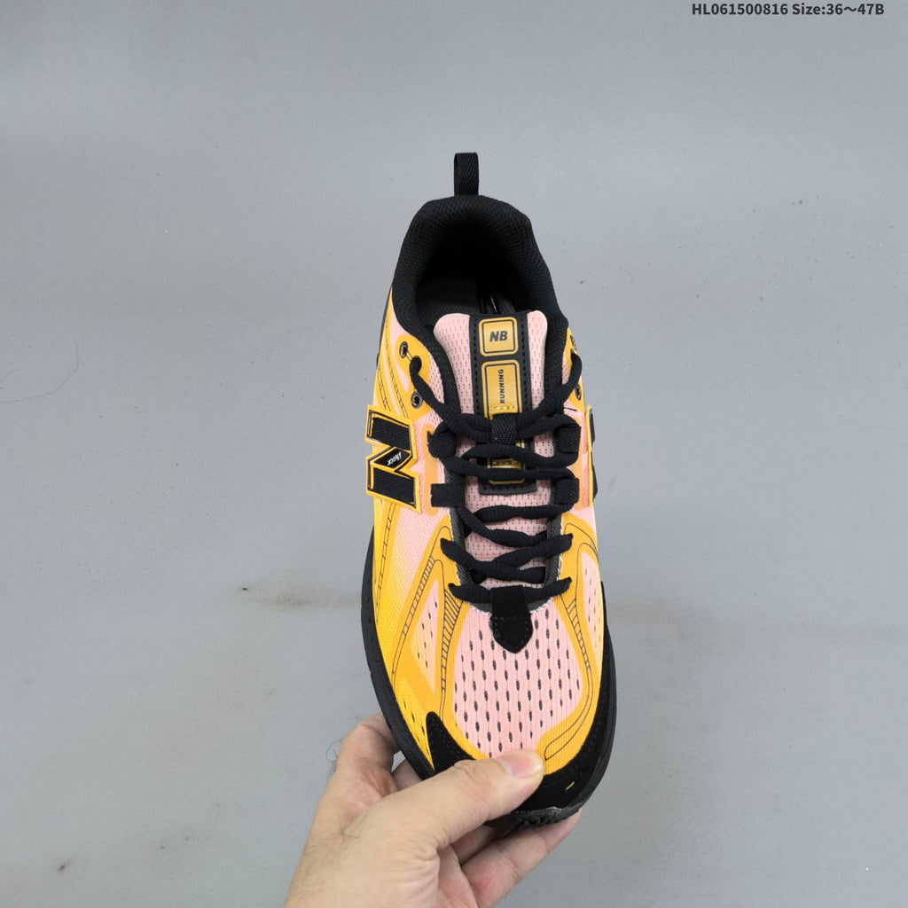 New Balance M1906R Sneakers in Pink Yellow Black U1906596 - product image from the listing.