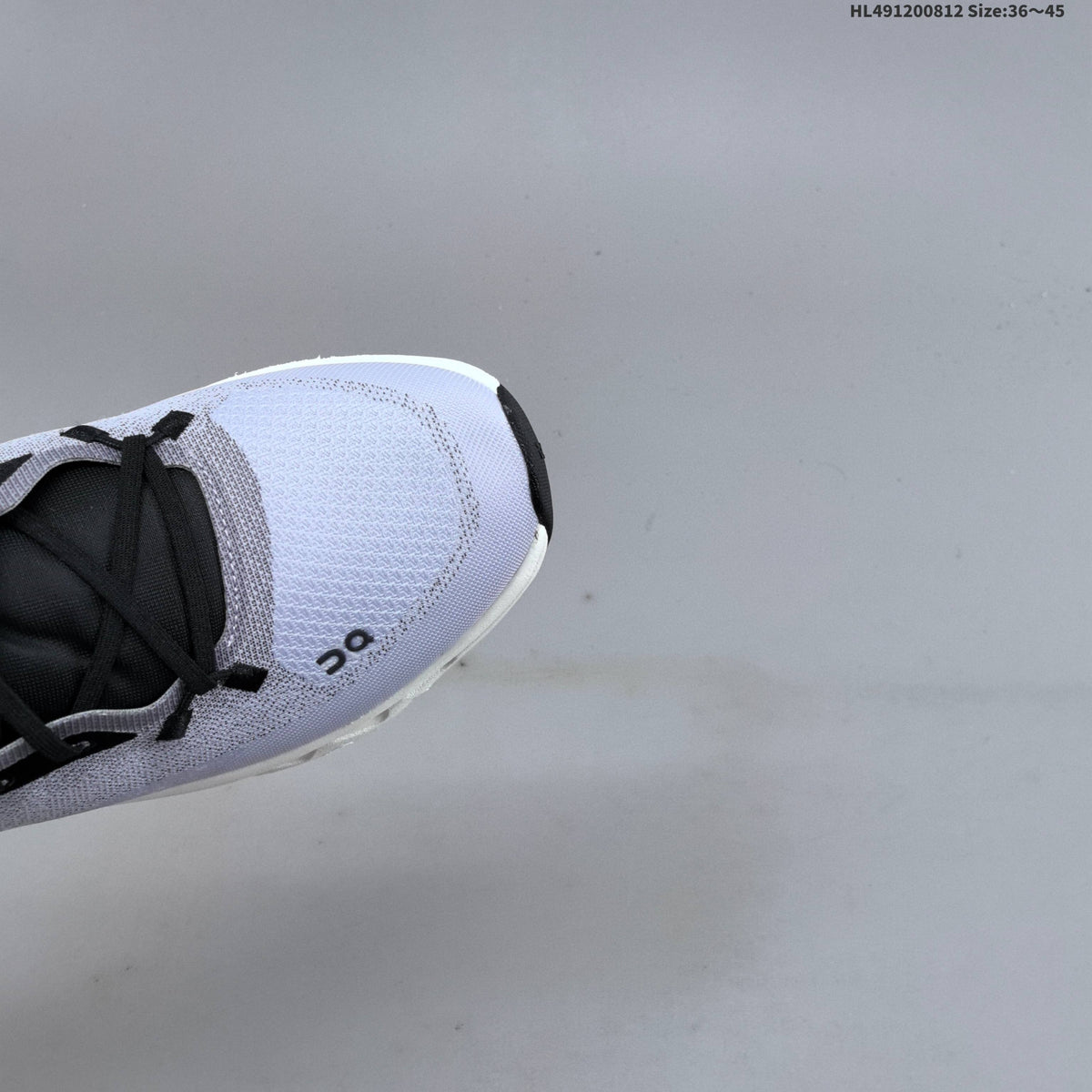 White and Black On Cloudtilt Sneakers - product image from the listing.