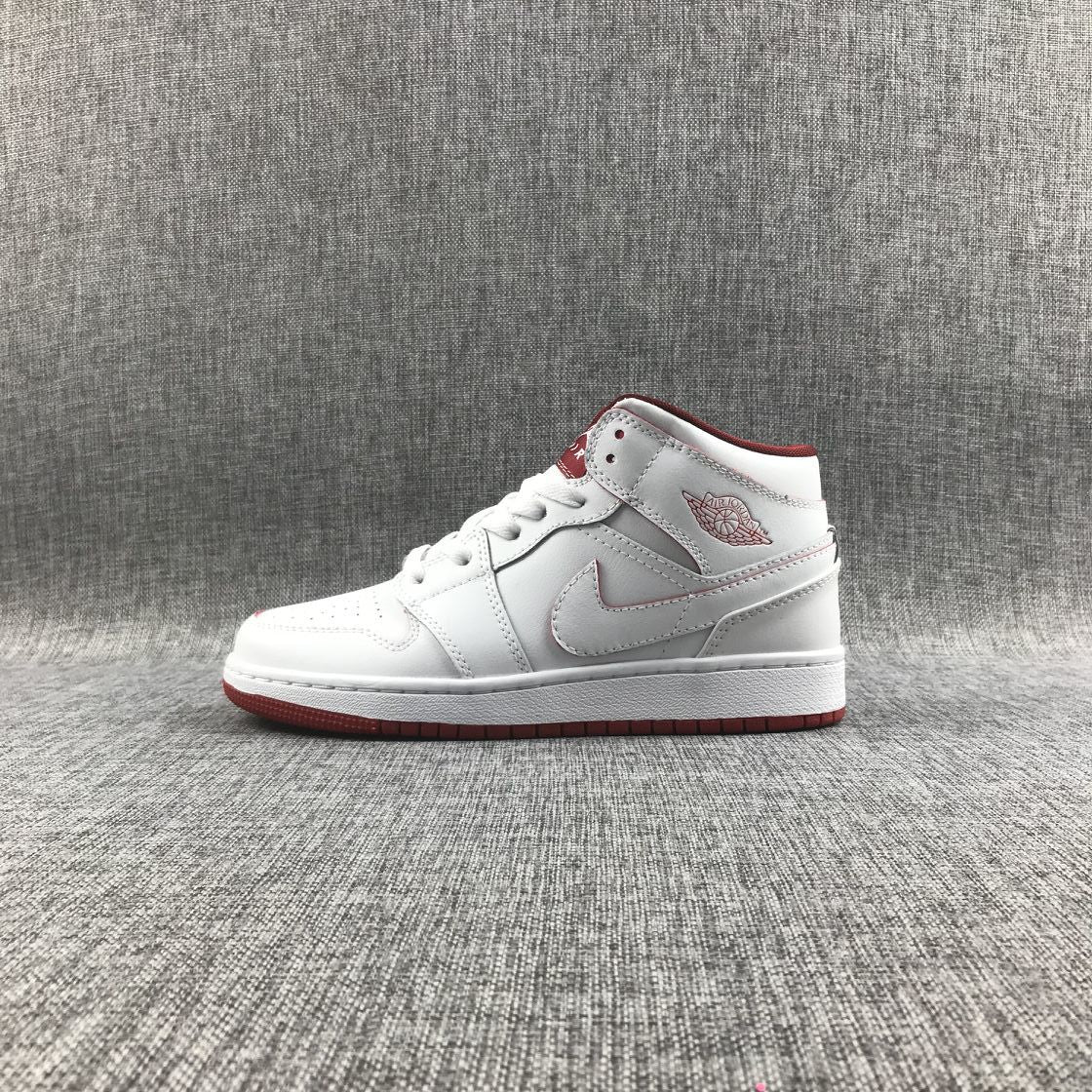Air Jordan 1 Mid Sneakers in White and Red 554725-103 - product image from the listing.
