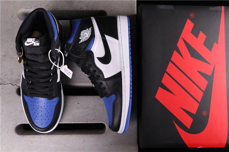Air Jordan 1 Game Royal High-Top Sneakers in Black Blue White - product image from the listing.