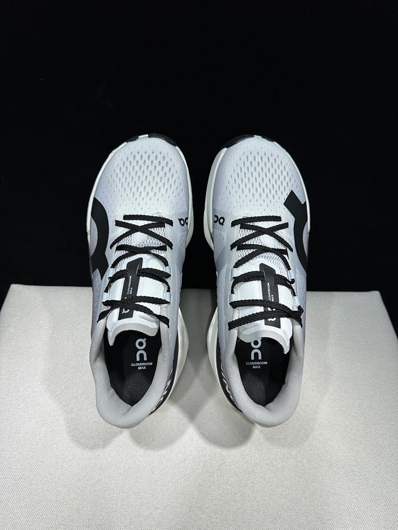 On Cloudboom Max Running Shoes, in White and Black - product image from the listing.