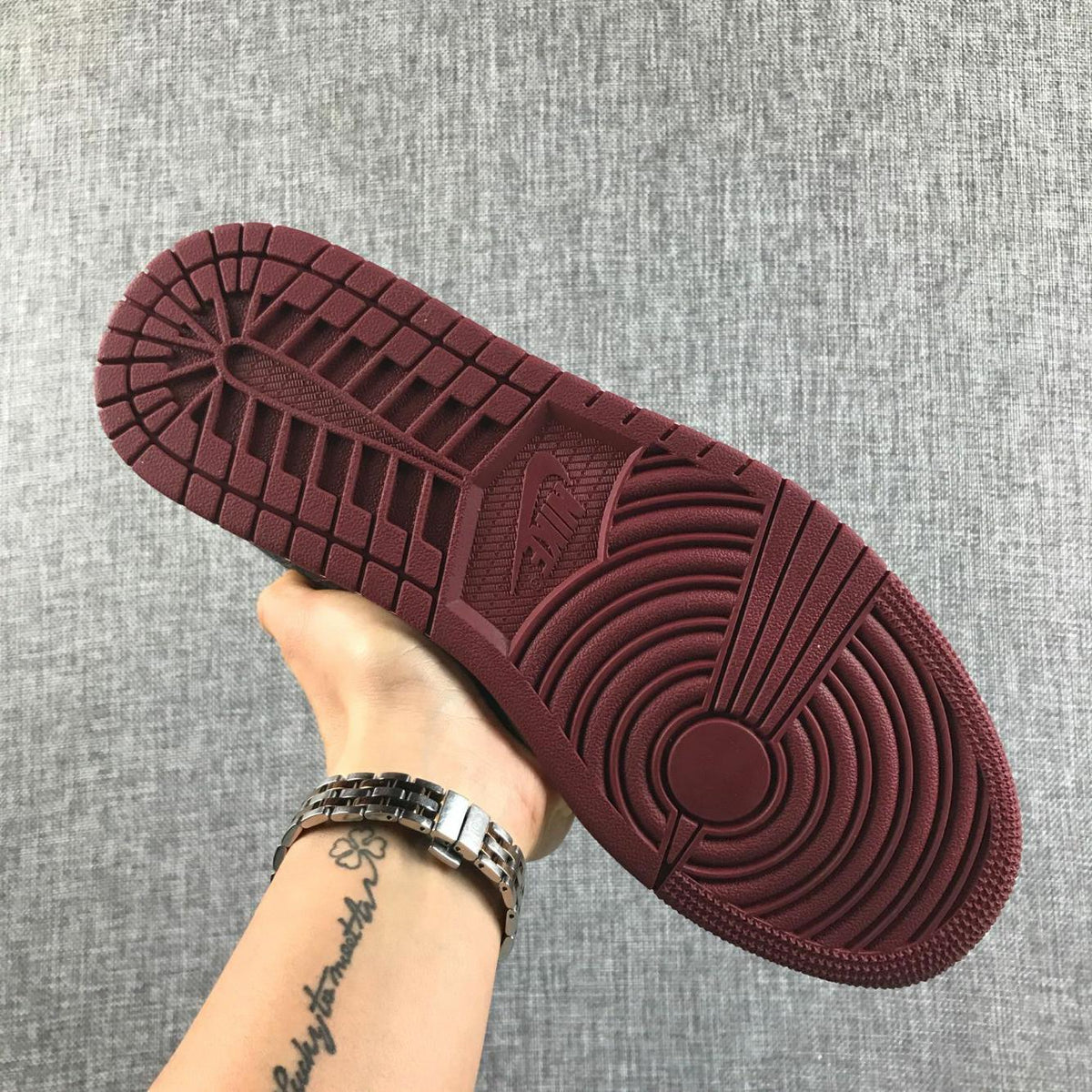 Air Jordan 1 Mid Sneakers in Black and Burgundy 554724-601 - product image from the listing.