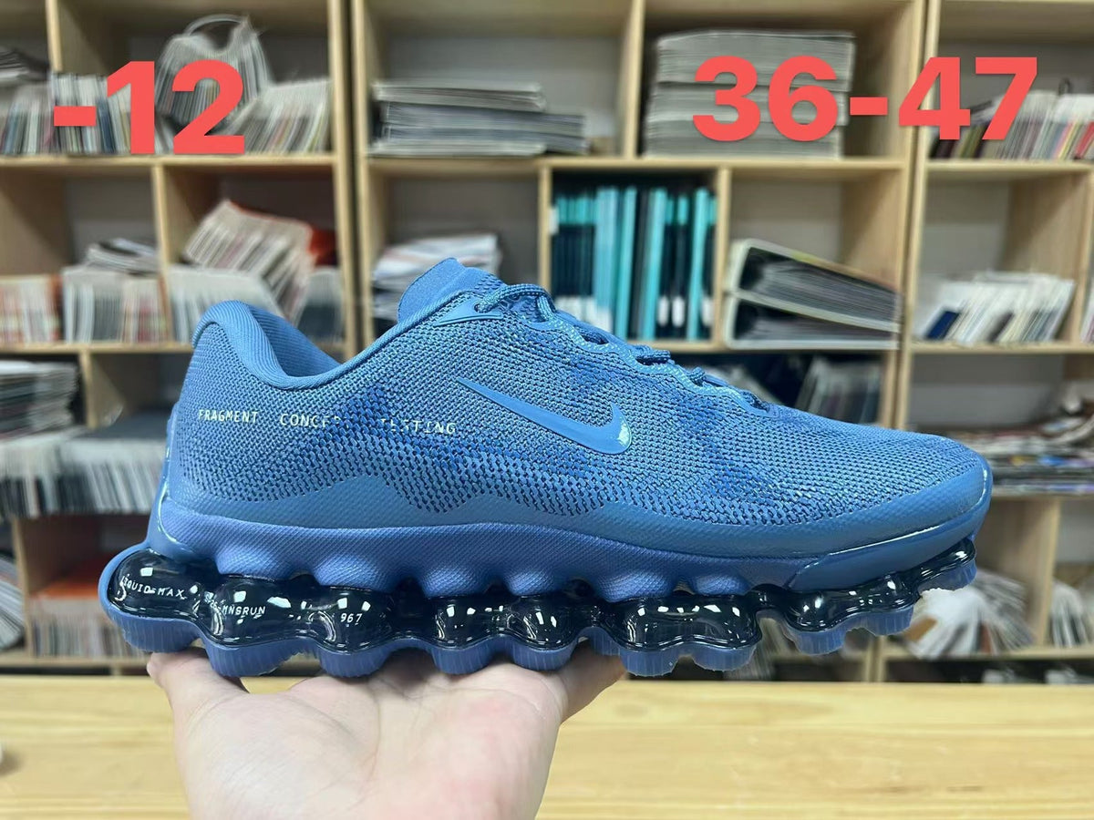 Nike Air Liquid Max Running Sneakers in Blue - product image from the listing.