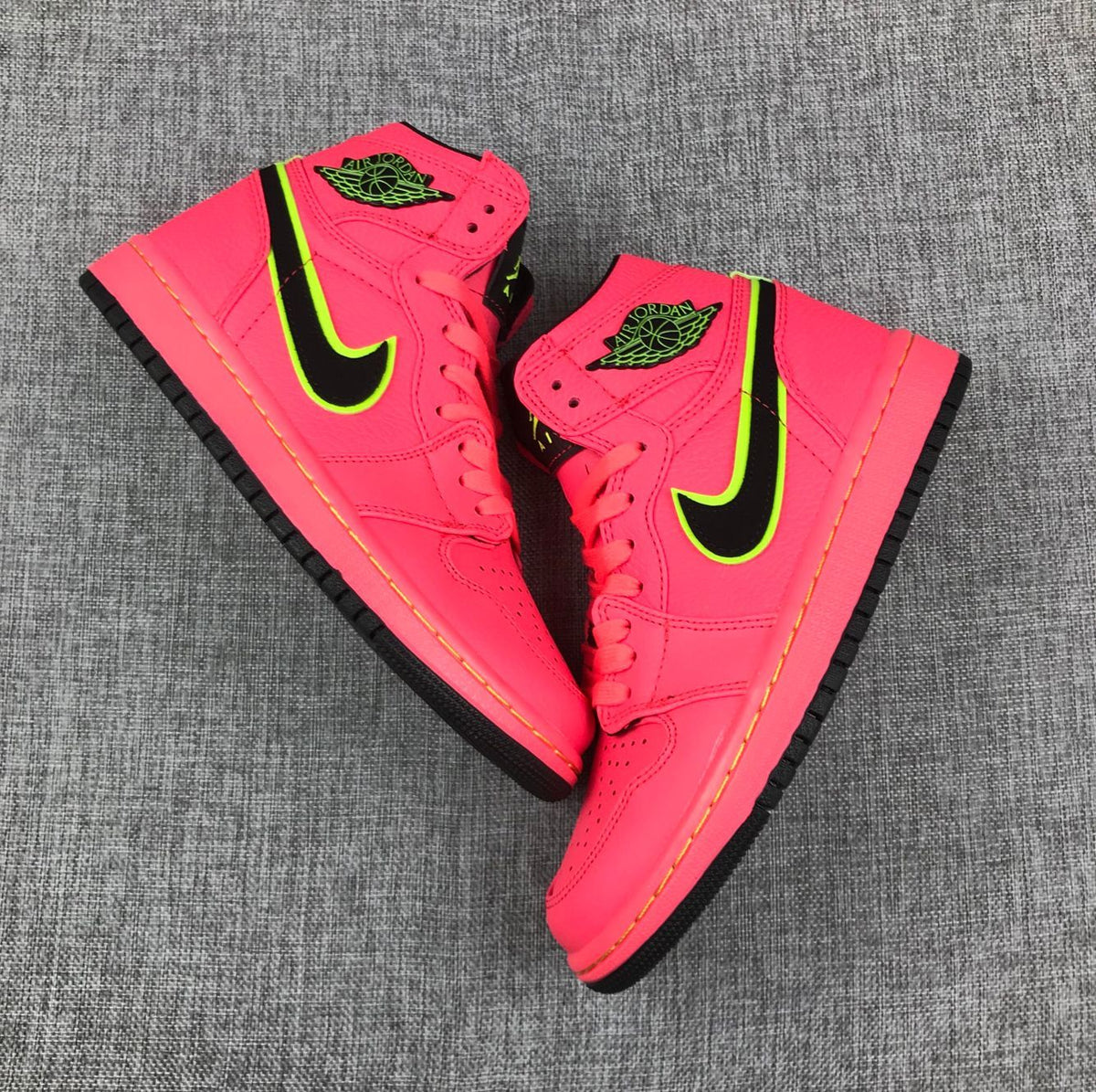 Pink and Black Air Jordan 1 Mid Sneakers AQ9131-600 - product image from the listing.
