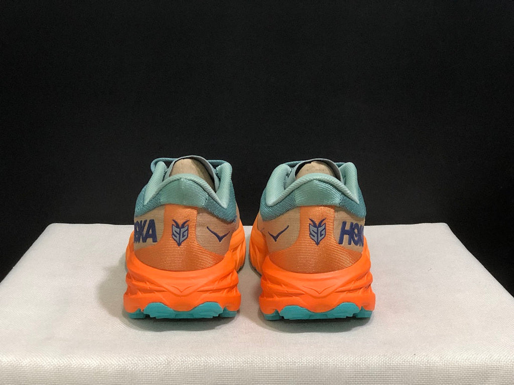 HOKA Speedgoat 5 Trail Running Shoes in Blue Orange - product image from the listing.