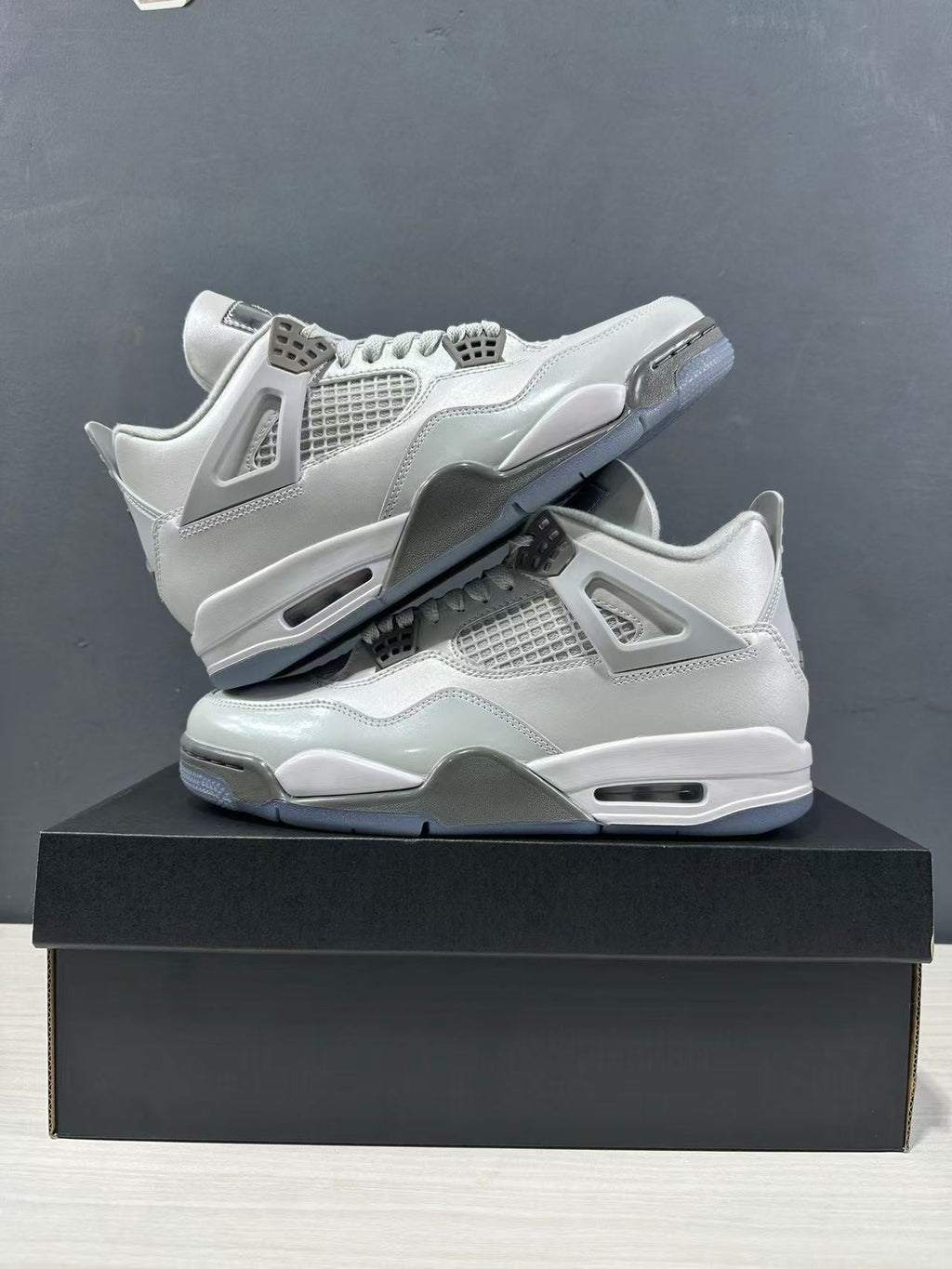 Air Jordan 4 Photon Dust Sneakers HV4401-014 - product image from the listing.