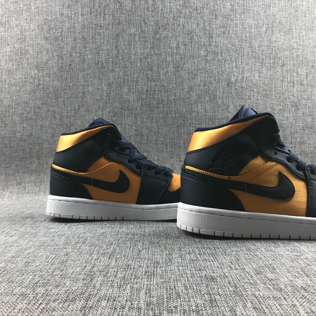 Air Jordan 1 Mid SE Sneakers in Black and Gold 852542-401 - product image from the listing.