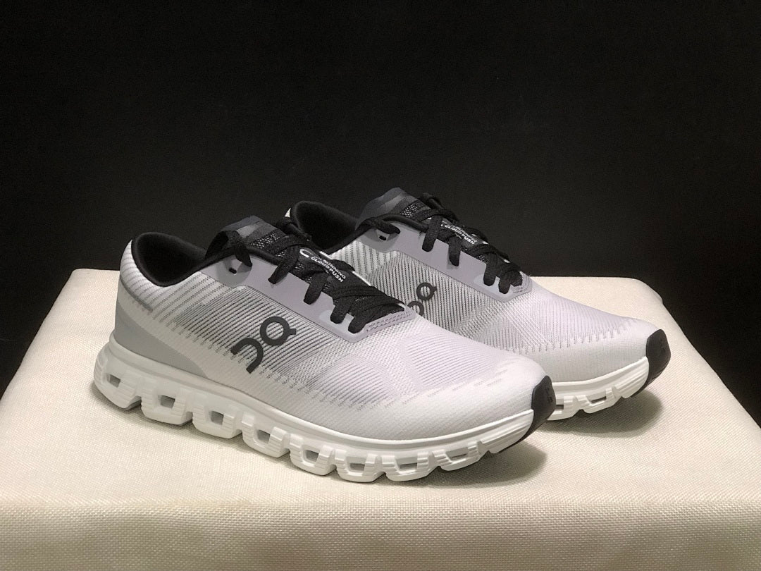 On Cloud 6 Push Sneakers in White Grey Black - product image from the listing.