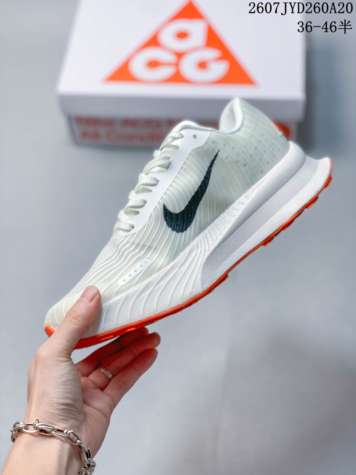Nike ACG Ultrafly Trail Sneakers in White Black Orange - product image from the listing.