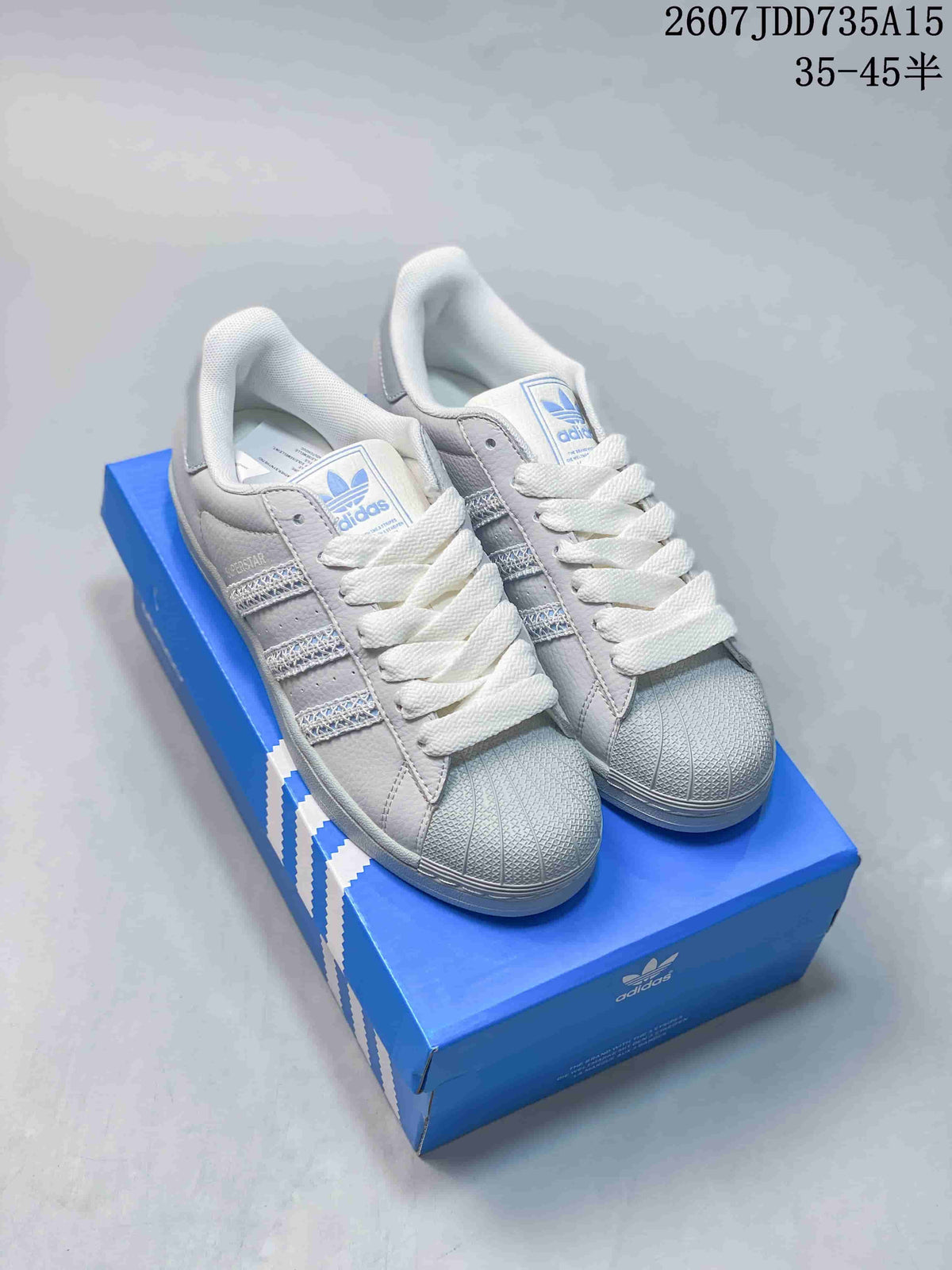 adidas Superstar Sneakers in White Gray Blue 2607JDD735A15 - product image from the listing.