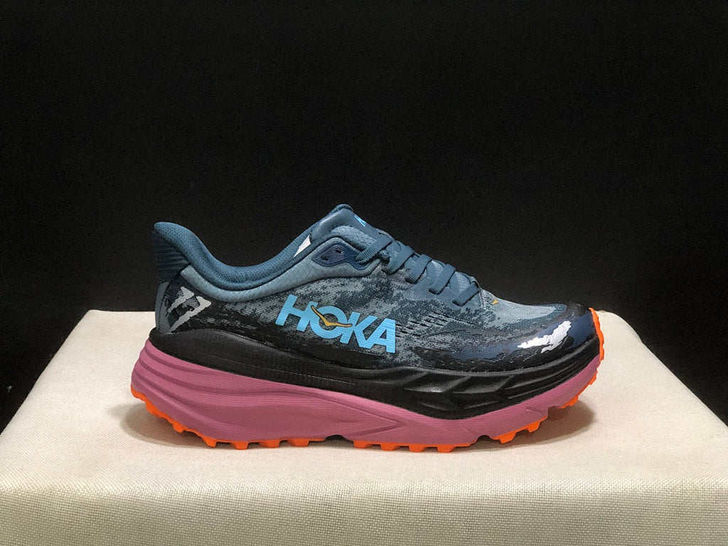 Blue and Orange HOKA Stinson 7 Trail Running Shoes - product image from the listing.