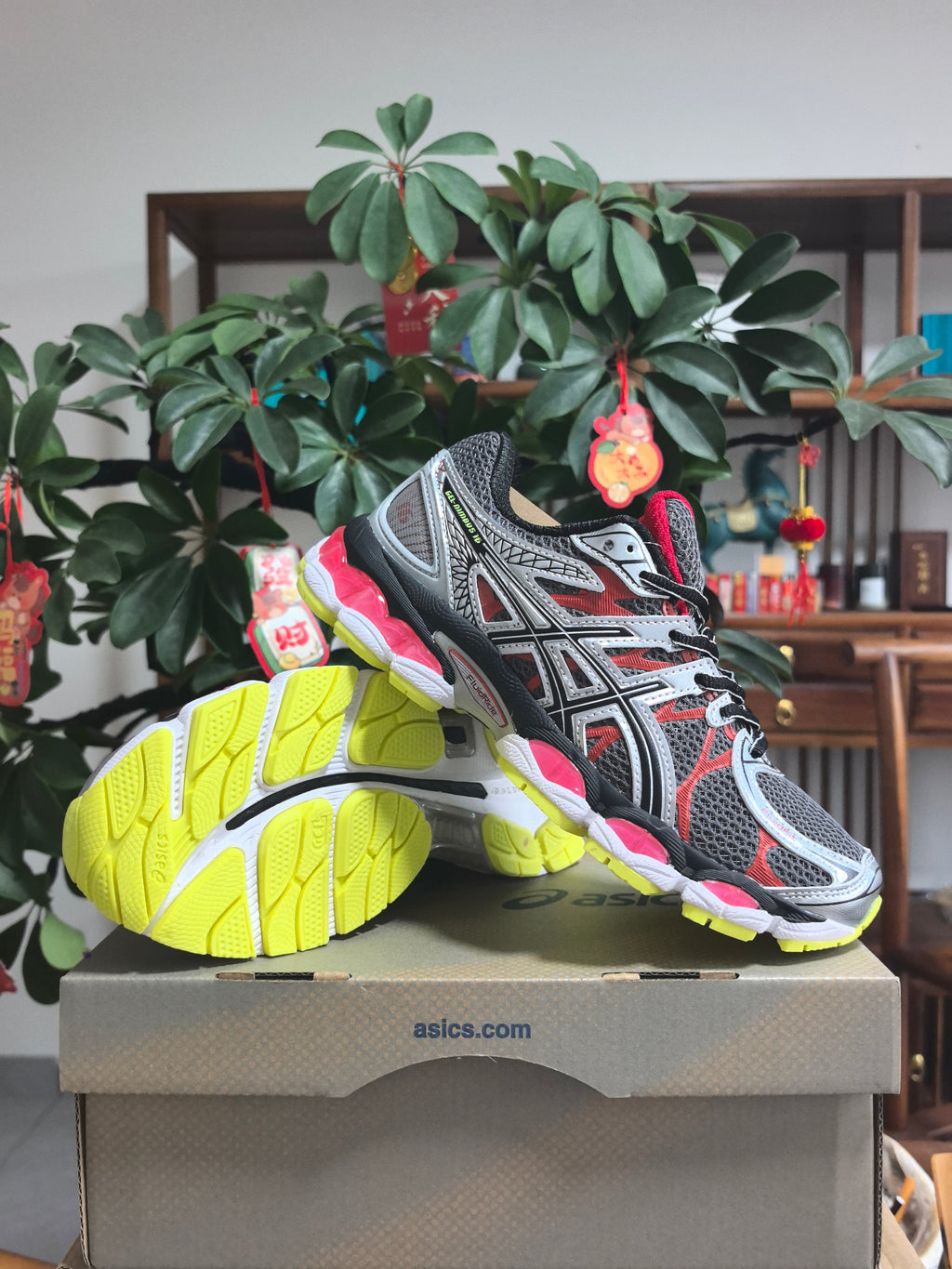 ASICS GEL-DIMENSION 16 Sneakers in Gray Red - product image from the listing.