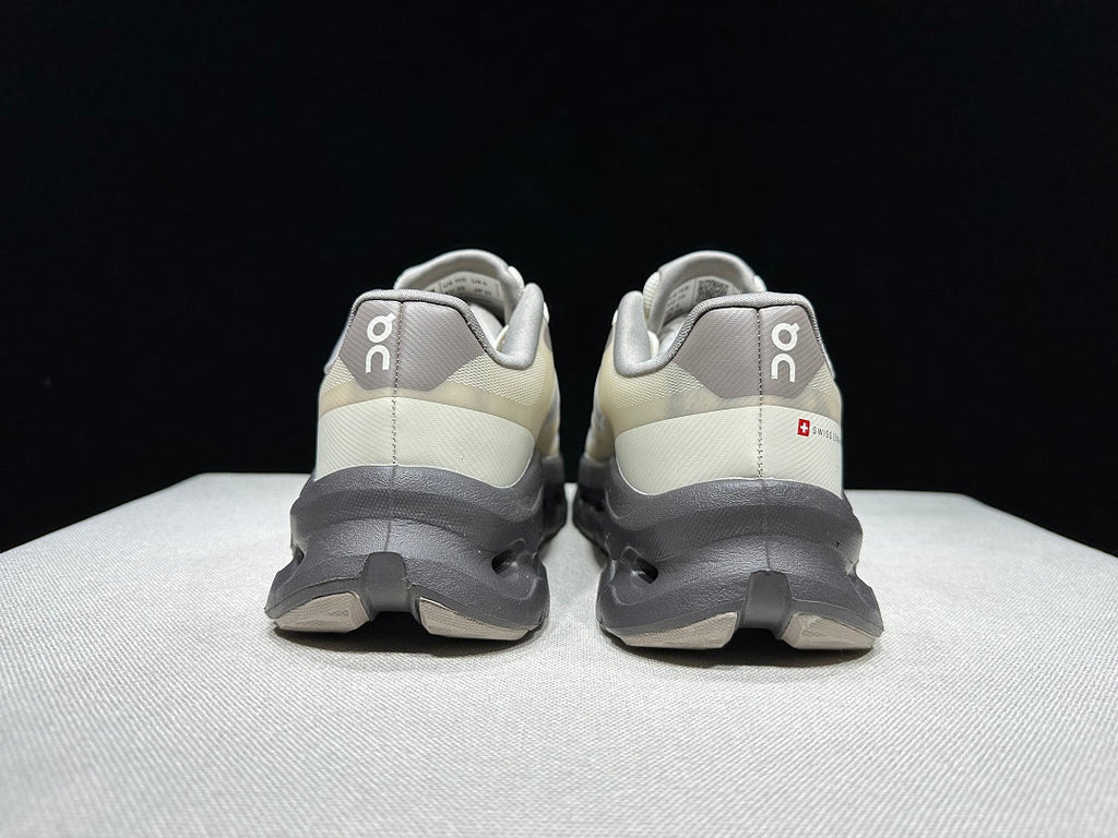 On Cloudtilt Remix Trainers in White and Pebble - product image from the listing.
