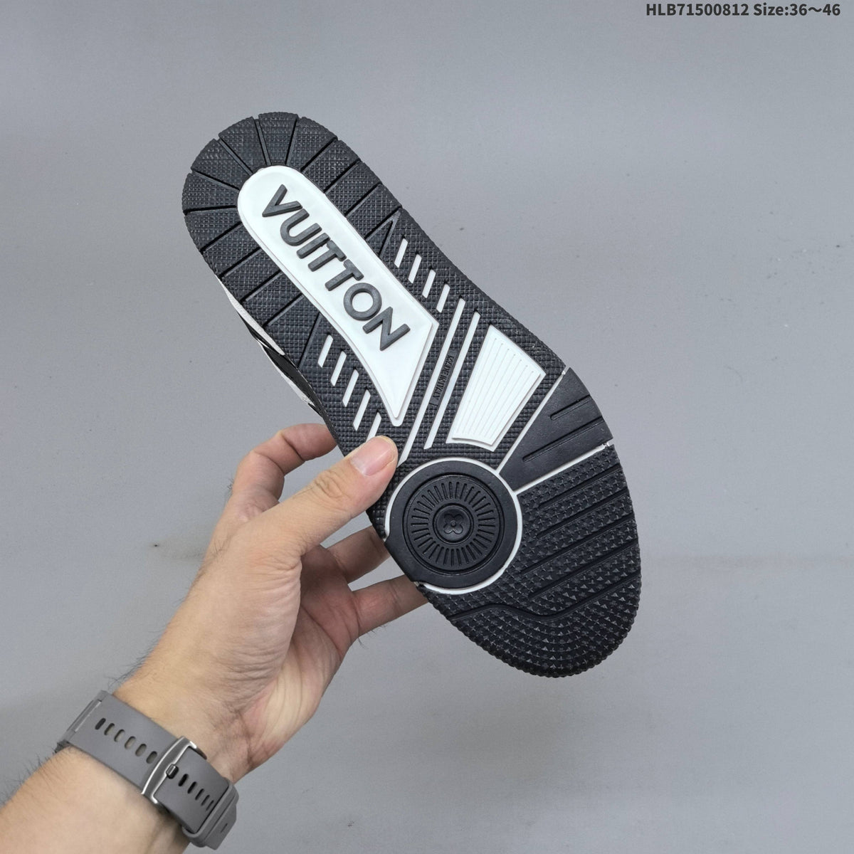 Louis Vuitton Low-Top Sneakers in White and Black - product image from the listing.