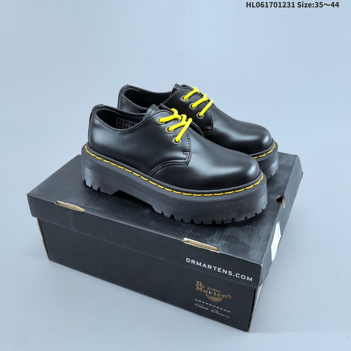 Black Dr. Martens 1460 Platform Lace-Up Boots - product image from the listing.
