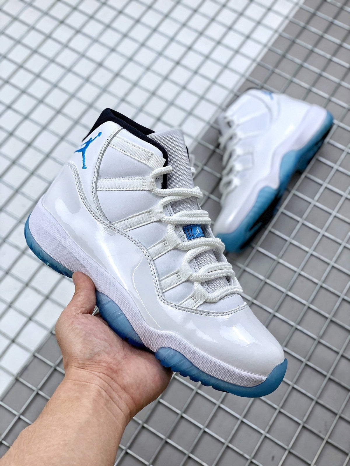 Jordan 11 Legend Blue Sneakers in White Blue 378037-117 - product image from the listing.