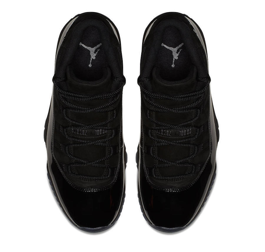 Air Jordan 11 Cap and Gown High-Top Sneakers in Black - product image from the listing.