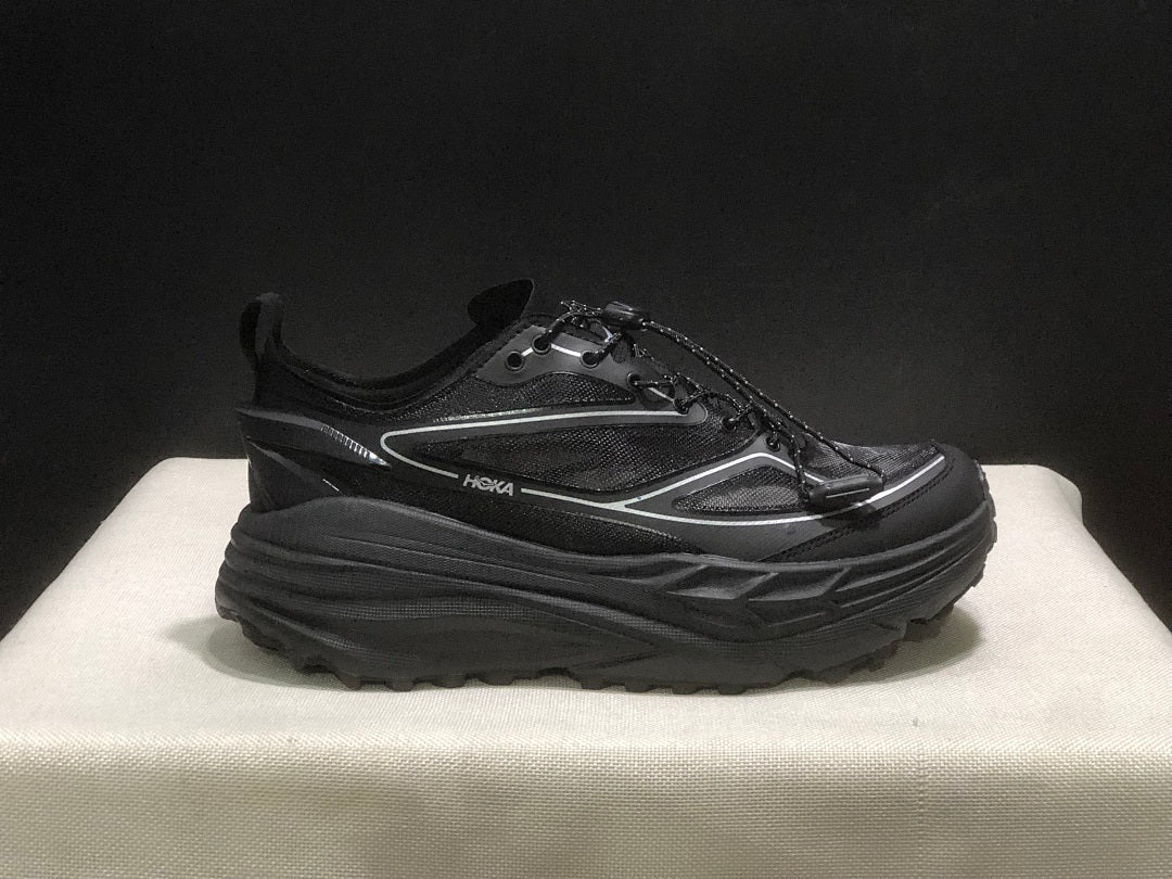 HOKA Stinson One 7 Black Trail Trainers - product image from the listing.