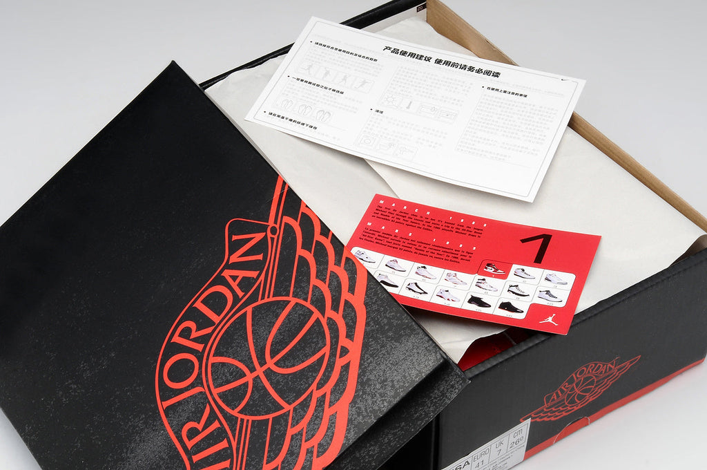 Air Jordan 1 Low Black Red Sneakers - product image from the listing.